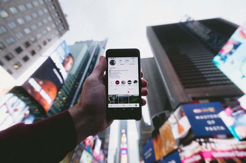 man holding mobile phone