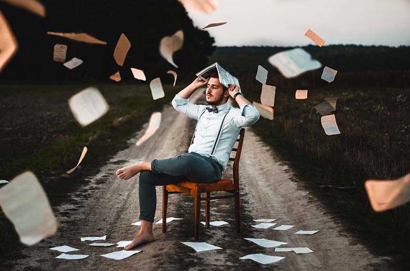 man holding book